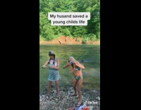 Guy saves little girl floating away river 