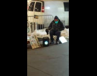 Guy wears flashing LED light skull mask 