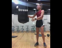 Girl punching bag self defense class bad vibes