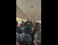 Subway passengers sing YMCA on speakers in train together
