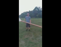 Guy burn long tube smoke comes out