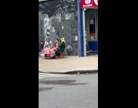 Friends wear costume eating on the street