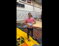 Guy throws ball at guy in slide 