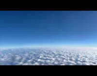 Submitter films sea of clouds from plane