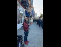 Man with duck balances on his hand