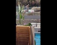 Two women in bikini selfie together at the round sunbed