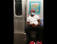 Guy face mask exposes nose red shoes 