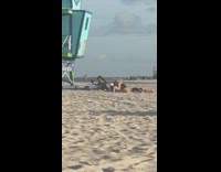 Girl thong bikini show butt lifeguard post