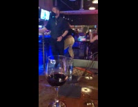 Woman Dances Next to Bar for Video in Vegas 