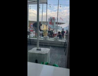 Collab IITW - Woman in black denim jacket poses outside the restaurant