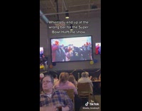 Girl at boring bar Superbowl Halftime Show