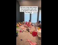 Man sings and plays with their daughters