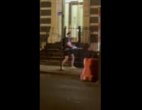 Collab WINY - Man carries and plays music on sidewalk