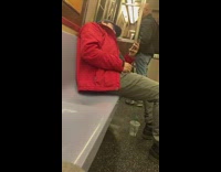 Collab Subway Creatures - Guy red jacket sings out loud with airpods in on subway train