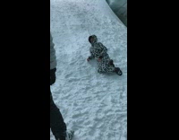 Guy animal print jacket pose on snow