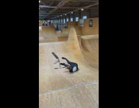 Black shirt guy falls on face scooter 