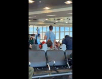 Woman gets pinned down by airport police