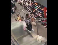 man in footlocker uniform dancing on stairs