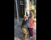 Black horse costume mask lady trump tower 