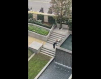 Girl poses by water fountain steps pt. 2 
