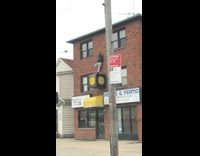 Asshole guy climbs up clock 