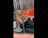 Shirtless man bleach his hair in subway