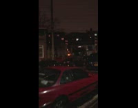 man shouting from his parked car on street