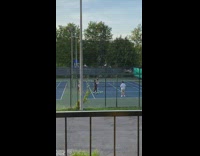 Man white top music video tennis court