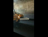 yellow cab dragging mattress on freeway