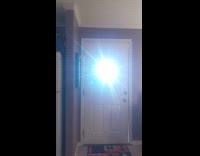 Rainbow comes from peephole on front door