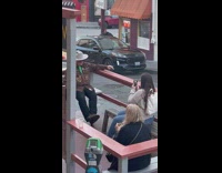 Collab IITW - Man in Cowboy Costume Poses as he Sits