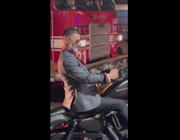 Guy dances on motorcycle 