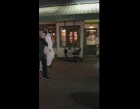 Corona virus white hazmat suits two guys 