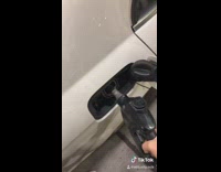 Guy takes pump out car spills gas