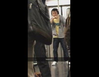 (DUPLICATE) Hmmm Yellow Shirt Headphones Guy Dances at End Subway