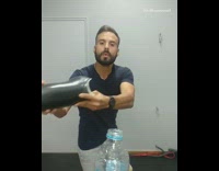 Guy uses his prosthetic leg to do the bottle cap challenge