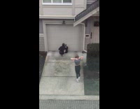 Two women tiktok dance on the driveway