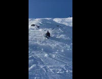 Lady Trips off Ski as she Skis Downhill