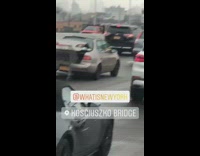 Car drags shopping cart on freeway