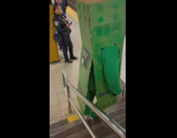 Police Looks at Lego Man Walk Down Stairs