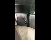 Needle with orange cap on the floor of subway station