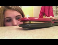 girl uses red straightener popcorn