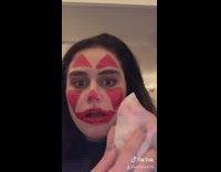 Girl cant wipe off red clown makeup from her face in dorms