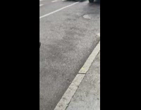 Guy rides homemade go kart with mattress down street