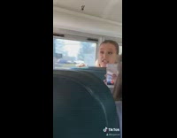 Guy girl argue school bus seats