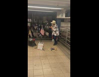 Two men cannot resist salsa dancing to the music at subway station