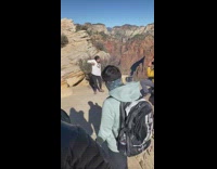 Girl white shirt dance  on mountain trail
