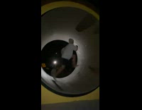 Guy running in huge hamster wheel 