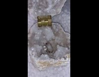 Girl opens geode box with heart ring 