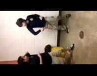 Two kids fight in school bathroom punch head